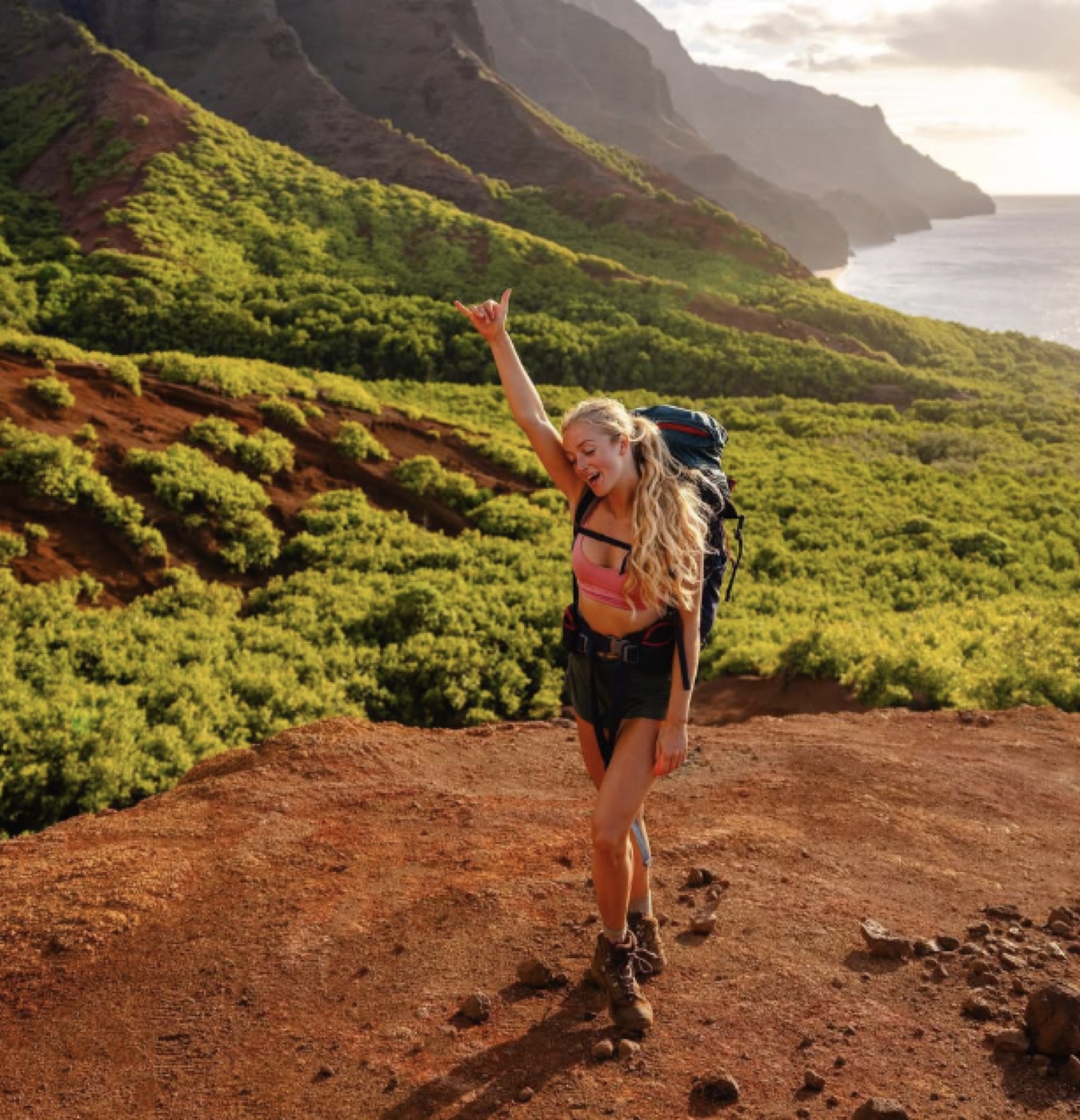 Hiker on a Kauai ridge trail