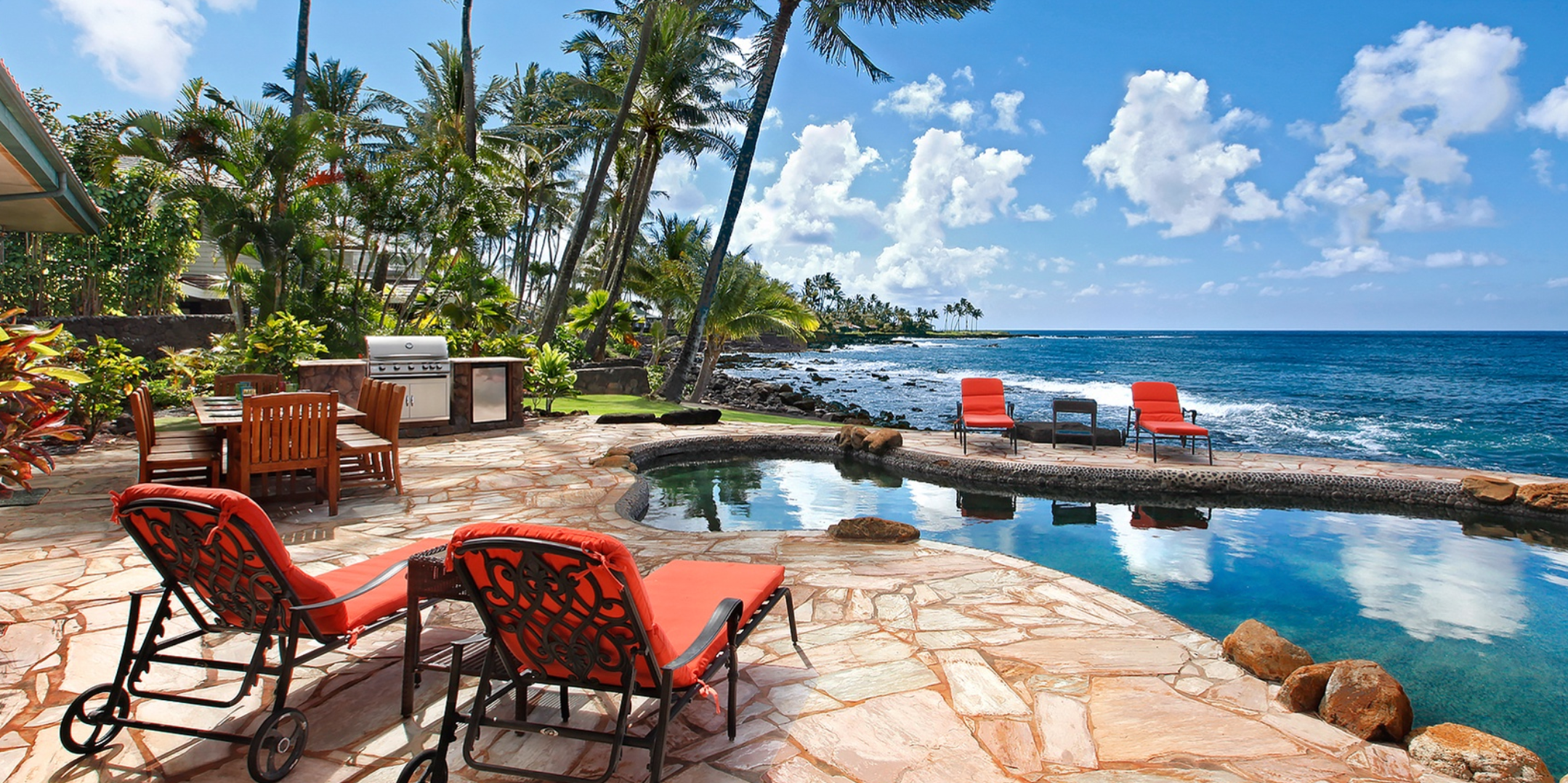 Ocean view infinity pool overlooking the Kauai coastline